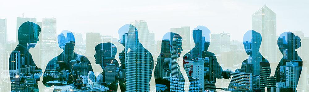 group of people in discussion - city skyline overlay